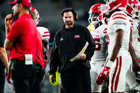 Head Coach, Michael Desormeaux in the huddle September 9, 2023 Louisiana @ Old Dominion University Football in Northfolk, VA at S.B. Ballard Stadium. Final score Louisiana 31 ODU 38. Photo by Benjamin R. Massey/Ragin Cajun Athletics