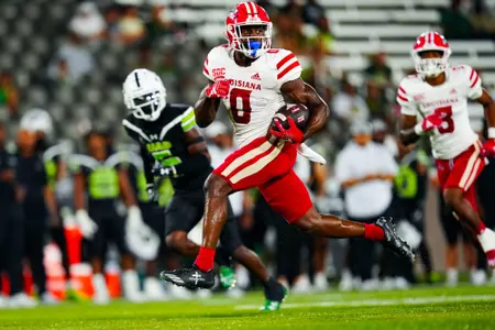 Jacob Kibodi runs the ball for a touchdown September 16, 2023 Louisiana vs University of Alabama Birmingham Football in Birmingham, AL at Protective Stadium. Final score Louisiana 41 UAB 21. Photo by Benjamin R. Massey/Ragin Cajun Athletics