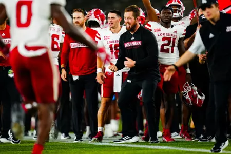 Assistant Director of Athletic Performance for Football, Connor Andras celebrates on the sideline September 16, 2023 Louisiana vs University of Alabama Birmingham Football in Birmingham, AL at Protective Stadium. Final score Louisiana 41 UAB 21. Photo by Benjamin R. Massey/Ragin Cajun Athletics