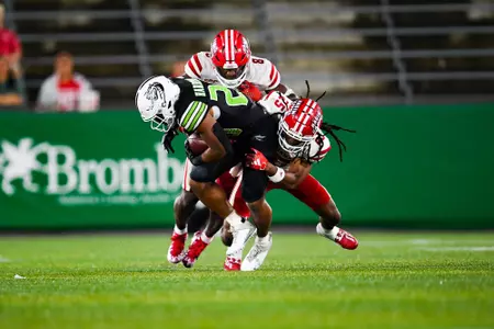 Glenn Brown and K.C. Ossai makes a tackle September 16, 2023 Louisiana vs University of Alabama Birmingham Football in Birmingham, AL at Protective Stadium. Final score Louisiana 41 UAB 21. Photo by Benjamin R. Massey/Ragin Cajun Athletics