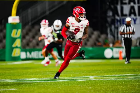 Neal Johnson after the catch September 16, 2023 Louisiana vs University of Alabama Birmingham Football in Birmingham, AL at Protective Stadium. Final score Louisiana 41 UAB 21. Photo by Benjamin R. Massey/Ragin Cajun Athletics