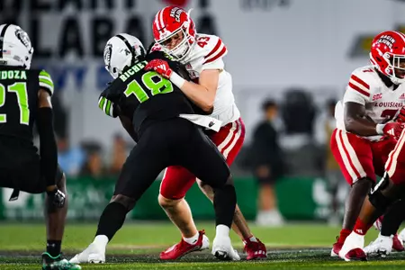 Ty Stamey makes a block September 16, 2023 Louisiana vs University of Alabama Birmingham Football in Birmingham, AL at Protective Stadium. Final score Louisiana 41 UAB 21. Photo by Benjamin R. Massey/Ragin Cajun Athletics