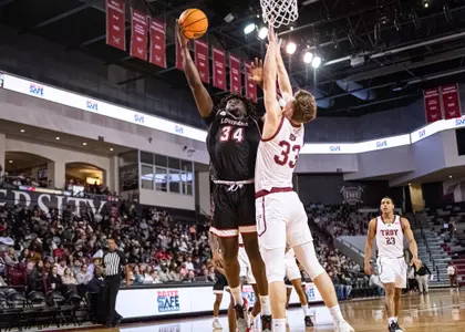 Hosana Kitenge goes up for a layup