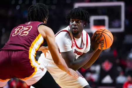 Hosana Kitenge triple threat November 27, 2023 Louisiana vs Loyola New Orleans Men's Basketball in Lafayette, LA at the Cajundome. Final score Louisiana 78 Loyola NO 54. Photo by Benjamin R. Massey/Ragin Cajun Athletics