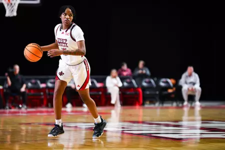 Tamiah Robinson dribbles December 30, 2023 Louisiana vs Appalachain State Women's Basketball in Lafayette, LA at the Cajundome. Final score Louisiana 56 App State 69. Photo by Benjamin R. Massey/Ragin Cajun Athletics