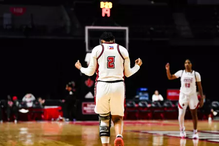 Brandi Williams celebrates making a four point play January 25, 2024 Louisiana vs Coastal Carolina Women's Basketball in Lafayette, LA at the Cajundome. Final score Louisiana 67 CCU 51. Photo by Benjamin R. Massey/Ragin Cajun Athletics