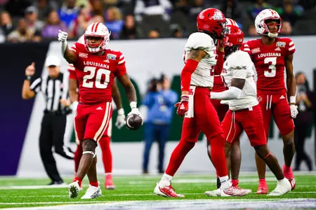 Dre’lyn Washington celebrates a first down December 16, 2023 Louisiana vs Jacksonville State Football in New Orleans, LA for the R.L. Carriers New Orleans Bowl at Ceasars New Orleans Superdome. Final score Louisiana #31 Jacksonville State 34. Photo by Benjamin R. Massey/Ragin Cajun Athletics