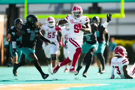 Lance LeGendre after the catch October 19, 2024 Louisiana @ Coastal Carolina Football in Conway, SC at Brooks Stadium. Final score Louisiana 34 CCU 24. Photo by Benjamin R. Massey/Ragin’ Cajun Athletics