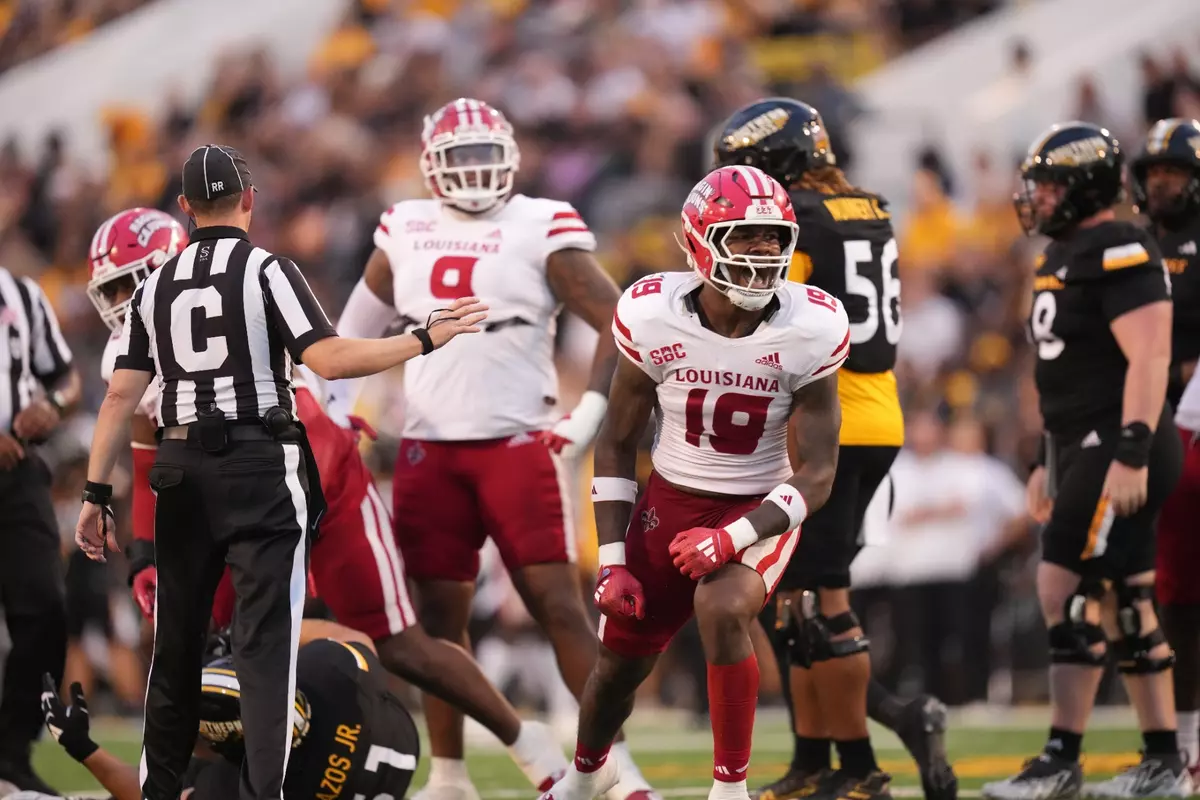 Cameron Whitfield celebrates the first of a school-record tying four sacks in Saturday's 23-13 win at Southern Miss