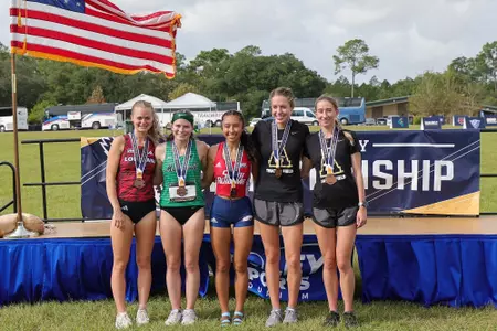Isabelle Russell celebrates a top 10 finish at the 2024 SBC XC Championships