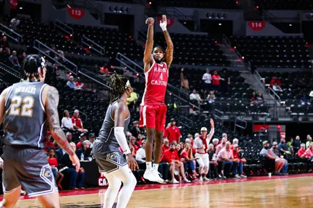 Kyndall Davis shoots a three against Kent State