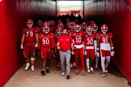 Michael Desormeaux leads the team down the tunnel for pregame warmups November 9, 2024 Louisiana vs Arkansas State Football in Lafayette, LA at Cajun Field. Final score Louisiana 55 Arkansas State 19. Photo by Benjamin R. Massey/Ragin’ Cajun Athletics