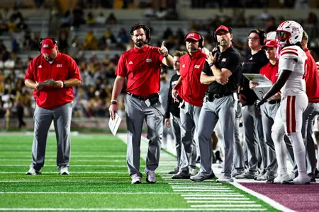 Michael Desormeaux on the sideline with Steve Farmer, Jorge Munoz, and Tim Leger in the background October 29, 2924 Louisiana vs Texas State Football in San Marcos, Texas at UFCU Stadium. Final score Louisiana 23 TXST 17. Photo by Benjamin R. Massey/Ragin’ Cajun Athletics