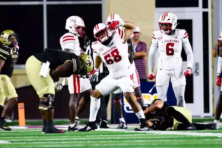 Fitzgerald West Jr. celebrates tackle October 29, 2924 Louisiana vs Texas State Football in San Marcos, Texas at UFCU Stadium. Final score Louisiana 23 TXST 17. Photo by Benjamin R. Massey/Ragin’ Cajun Athletics