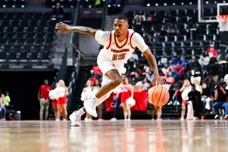 Christian Wright dribbles against Rice