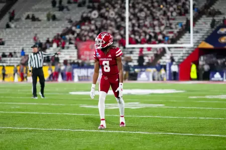Rahji Dennis pre snap December 7, 2024 Louisiana vs Marshall Football in Lafayette, LA at Cajun Field for the 2024 Sun Belt Conference Championship Game. Final score Louisiana 3 Marshall 31. Photo by Benjamin R. Massey/Ragin’ Cajuns Athletics