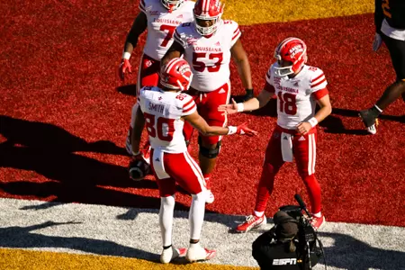 Tavion Smith celebrates touchdown catch with Chandler Fields November 30, 2024 Louisiana @ ULM Football in Monroe, LA at Malone Stadium. Final score Louisiana 37 Louisiana-Monroe 23. Photo by Benjamin R. Massey/Ragin’ Cajuns Athletics