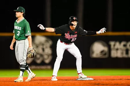 Conor Higgs celebrates double February 16, 2024 Louisiana vs Wright State Game 1 Baseball in Russo Park at M.L. "Tigue" Moore Field. Final Score Louisiana 3 Wright State 2. Photo by Benjamin R. Massey/Ragin Cajun Athletics