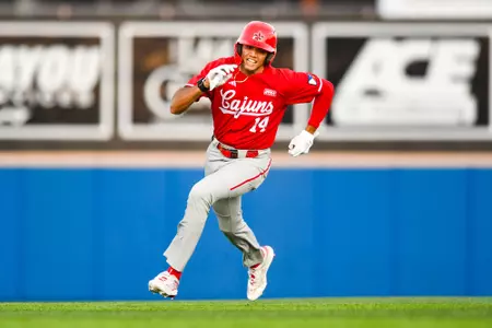 Trey LaFleur base running February 19, 2024 Louisiana @ McNeese Baseball at Joe Miller Ballpark. Final Score Louisiana 11 McNeese 3. Photo by Benjamin R. Massey/Ragin Cajun Athletics