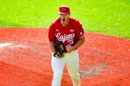 Andrew Herrmann celebrates strikeout February 25, 2024 Louisiana vs Rice Game 3 Baseball in Russo Park at M.L. "Tigue" Moore Field. Final Score Louisiana 3 Rice 0. Photo by Benjamin R. Massey/Ragin Cajun Athletics
