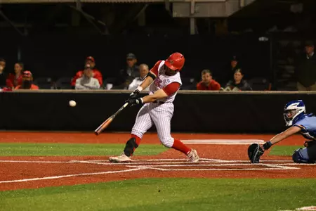 Lee Amedee with base hit against McNeese