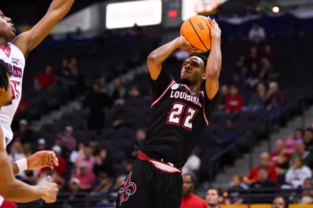 Kentrell Garnett shoots March 9, 2024 Louisiana vs Arkansas State Men's Basketball in Pensacola, FL at the Pensacola Bay Center. Final score Louisiana 62 Arkansas 89. Photo by Benjamin R. Massey/Ragin’ Cajun Athletics