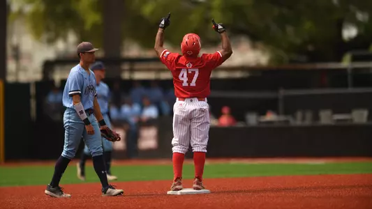Jose Torres Celebrates after his 8th inning double against ODU