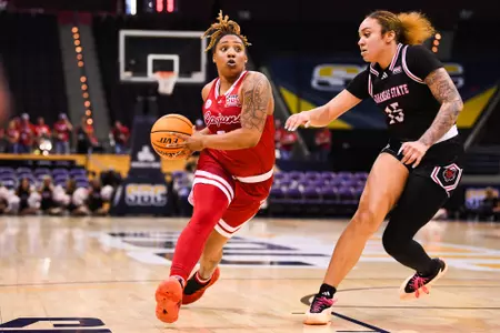 Destiny Rice dribbles March 6, 2024 Louisiana vs Arkansas State Women's Basketball in Pensacola, FL at the Pensacola Bay Center. Final score Louisiana 54 Arkansas State 41. Photo by Benjamin R. Massey/Ragin Cajun Athletics
