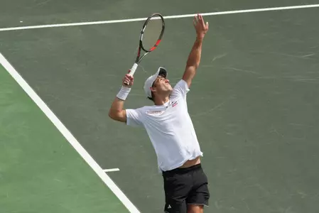 Vasil Dimitrov serves against Coastal Carolina