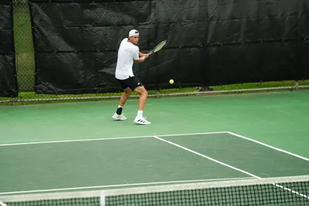 Alejandro Sanchez Gonzalez shoots a backhand