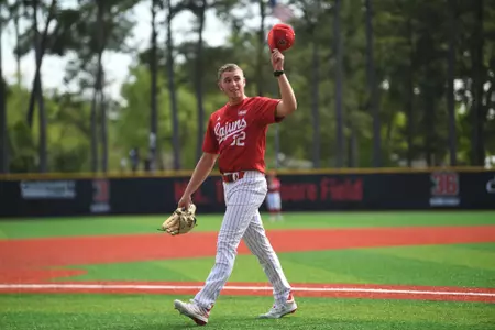 Carson Fluno tips his hit to the Tigue Moore Field crowd after his outing against Marshall on Sunday