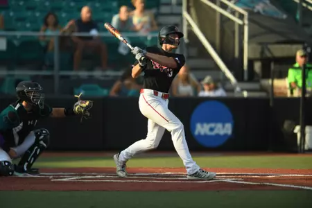 Conor Higgs hits the second of two home runs in Saturday's series finale at Coastal Carolina
