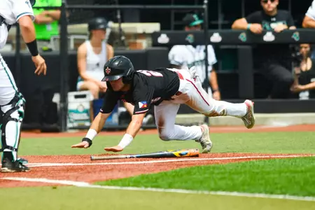Maddox Mandino base running slides into home April 20, 2024 Louisiana @ Coastal Carolina Game 2 Baseball in Springs Brooks Stadium in Conway, SC. Final Score Louisiana 8 CCU 6. Photo by Benjamin R. Massey/Ragin’ Cajun Athletics