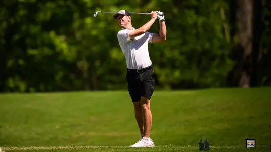 Malan Potgieter aims at the green during the second round of the SBC Men's Golf Championships