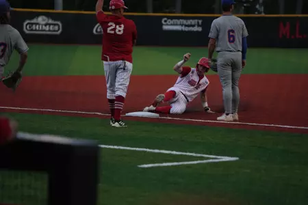 John Taylor slides into third during Wednesday's game against Houston Christian