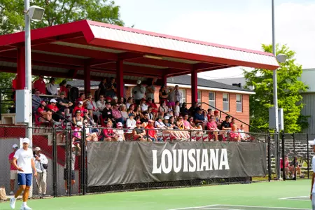 Crowd at Tennis Doubles April 14, 2024 Louisiana vs. Georgia Southern Men’s Tennis at Cajun Courts in Lafayette, LA. Final score Louisiana 1 GSU 4. Photo by Benjamin R. Massey/Ragin’ Cajun Athletics