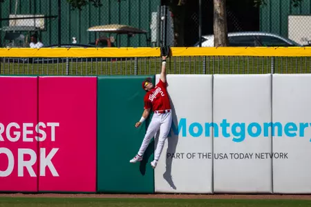 Bryan Broussard, Jr. tries to grab Kenny Levari's solo home run in the first inning on Wednesday at the SBC Championships