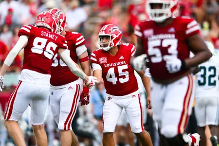 Kenneth Almendares celebrates a field goal with Ty Stamey September 21, 2024 Louisiana vs Tulane Football in Lafayette, LA at Cajun Field. Final score Louisiana 33 Tulane 41. Photo by Benjamin R. Massey/Ragin’ Cajun Athletics
