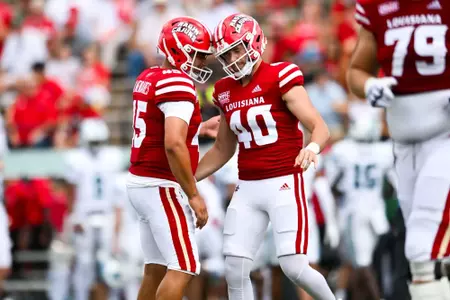 Kenneth Almendares celebrates with Hunter Sims September 21, 2024 Louisiana vs Tulane Football in Lafayette, LA at Cajun Field. Final score Louisiana 33 Tulane 41. Photo by Benjamin R. Massey/Ragin’ Cajun Athletics