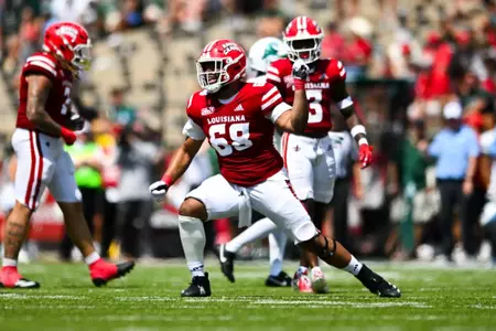 Fitzgerald West Jr. celebrates tackle September 21, 2024 Louisiana vs Tulane Football in Lafayette, LA at Cajun Field. Final score Louisiana 33 Tulane 41. Photo by Benjamin R. Massey/Ragin’ Cajun Athletics