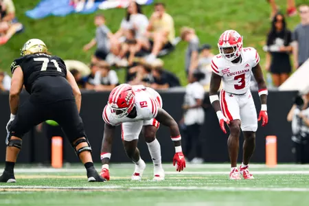 Cameron Whitfield and Tyrone Lewis, Jr. pre snap September 28, 2024 Louisiana @ Wake Forest Football in Winston-Salem, NC at Allegacy Federal Credit Union Stadium. Final score Louisiana 41 Wake Forest 38. Photo by Benjamin R. Massey/Ragin’ Cajun Athletics