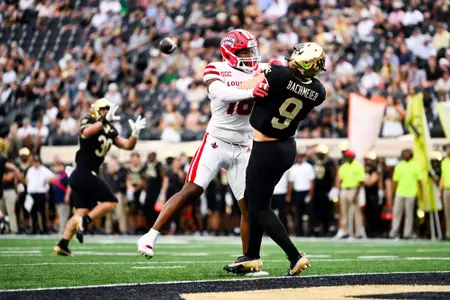Kailep Edwards hits the quarterback September 28, 2024 Louisiana @ Wake Forest Football in Winston-Salem, NC at Allegacy Federal Credit Union Stadium. Final score Louisiana 41 Wake Forest 38. Photo by Benjamin R. Massey/Ragin’ Cajun Athletics