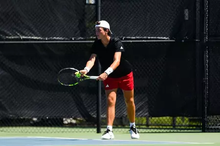 Mason Landreth prepares to serve