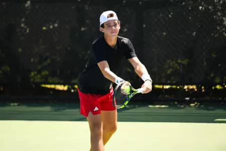 Mason Landreth prepares to serve