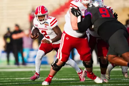 D'Wanye' Winfield runs the ball December 28, 2025 Louisiana vs TCU Football in Albuquerque, New Mexico at the University of New Mexico, University Stadium for the New Mexico Bowl. Final score Louisiana 3 TCU 34. Photo by Benjamin R. Massey/Ragin’ Cajuns Athletics