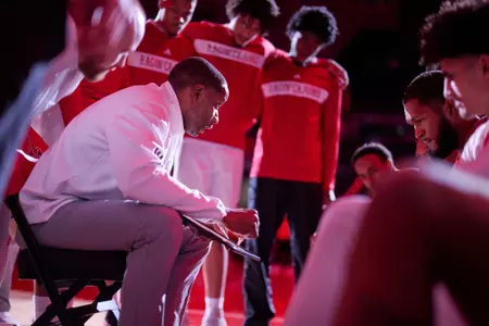 Derrick Zimmerman coaches his team in the huddle