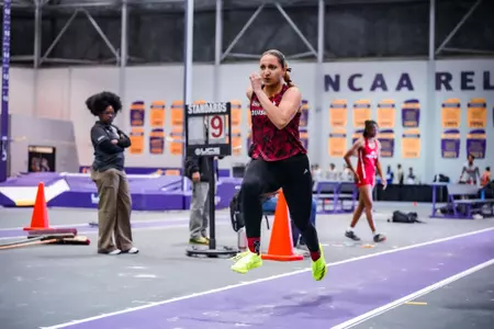 Reem Tammam attempts a jump at the Purple Tiger Invite