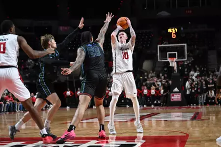 Jaxon Olvera shoots over a pair of Tulane defenders in the second half on Tuesday at the Cajundome