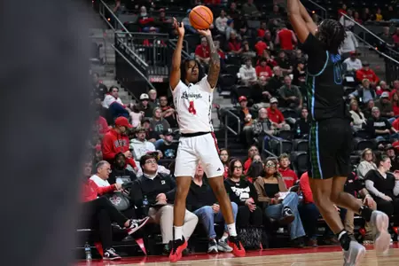Dariyus Woodsen shoots a 3-pointer in Louisiana's game against Tulane at the Cajundome