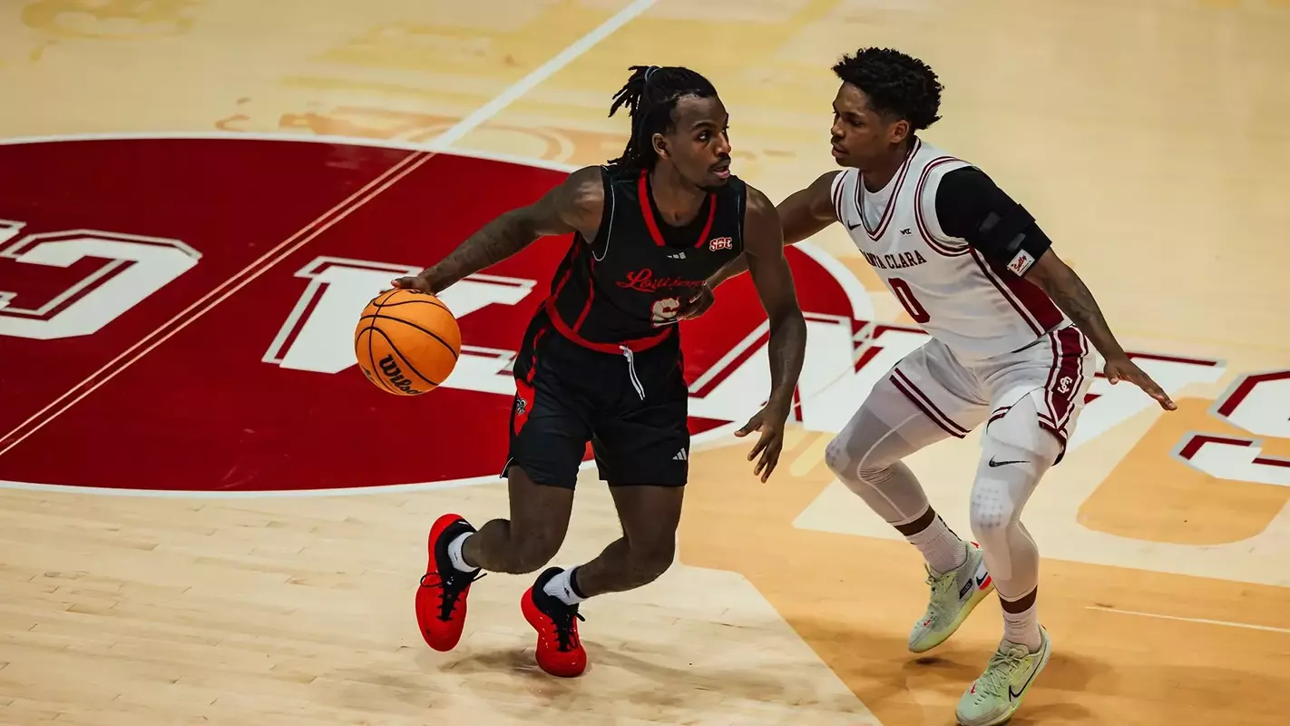 De'Vion Lavergne is guarded by Santa Clara's Brenton Knapper in Friday's non-conference game at Leavey Center